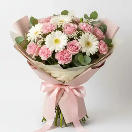 A beautiful purple and pink bouquet featuring fresh seasonal flowers in a soft pastel arrangement.