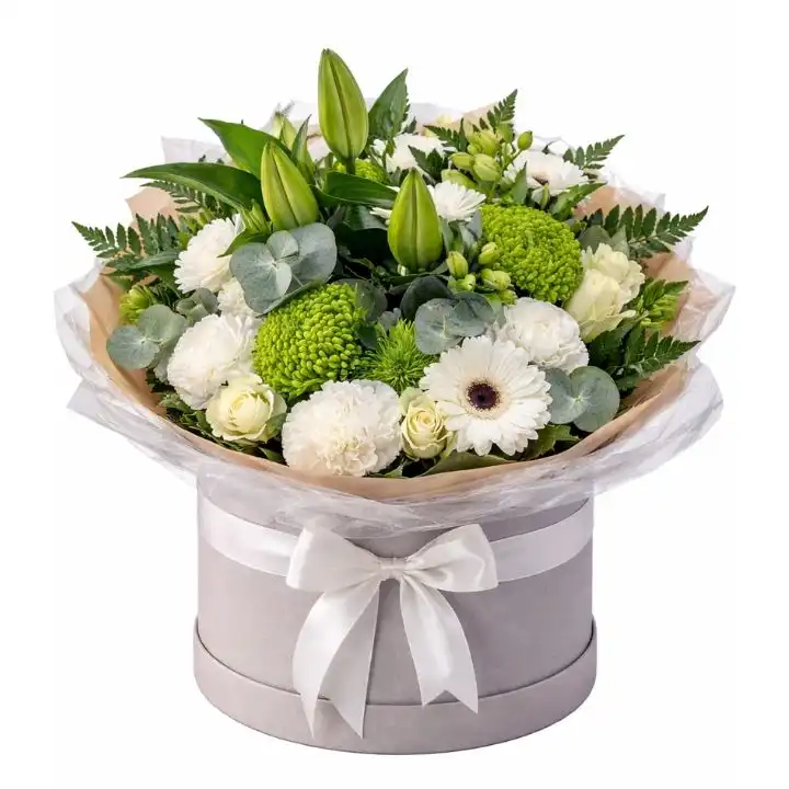 Elegant White Lily & Gerbera Daisy Bouquet 1 A stunning gerbera daisy and calla lily bouquet arranged with fresh greenery for an elegant floral display.