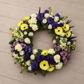 White Rose and Yellow Gerbera Funeral Wreath with Purple Hyacinth
