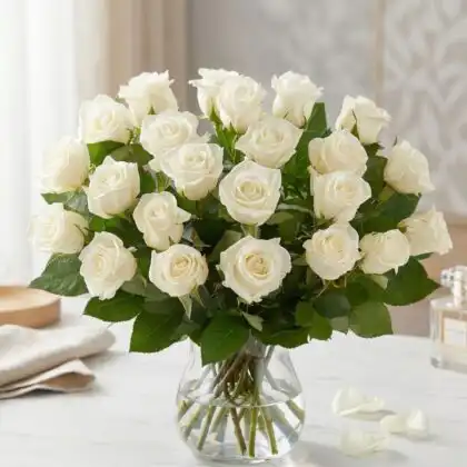 Hand-crafted 18 white rose bouquet wrapped in premium paper for an elegant floral gift.