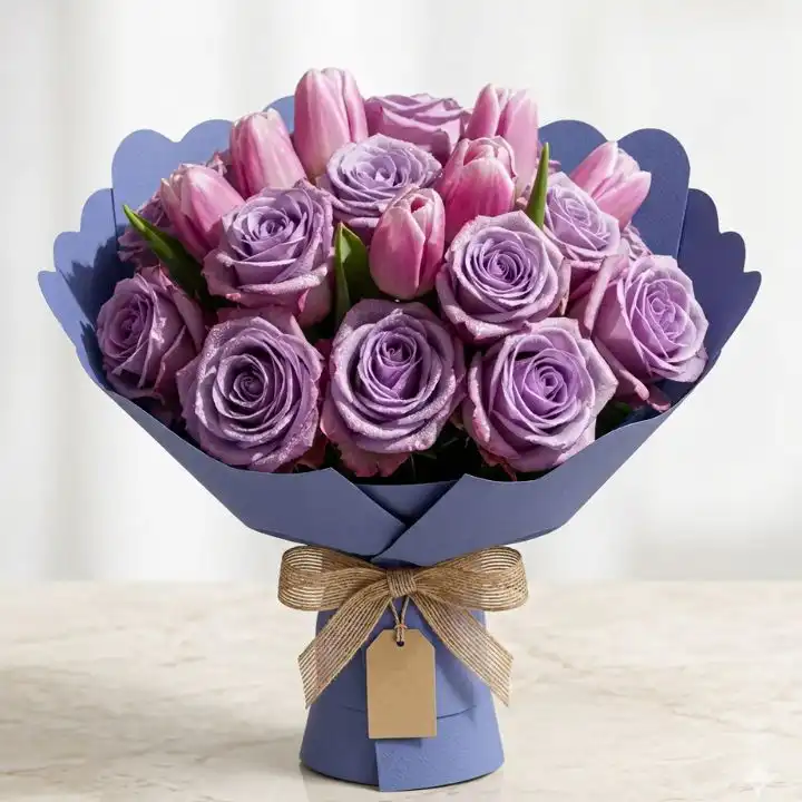 Lilac Rose & Pink Tulip Bliss Bouquet 1 Hand-tied bouquet of roses and tulips featuring soft lilac petals and vibrant pink blooms in a stylish arrangement.