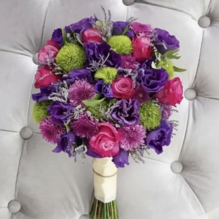 Pink Roses & Purple Lisianthus Premium Bouquet 1 A hand-tied roses and lisianthus bouquet featuring vibrant pink roses and deep purple lisianthus with green accents.