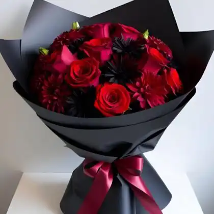 Stunning red roses wrapped in sleek black paper – perfect for any special occasion.
