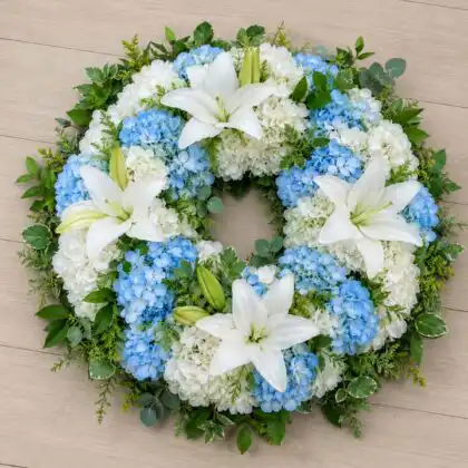 Serene Blue & White Lilies & Hydrangea Memorial Wreath with greenery