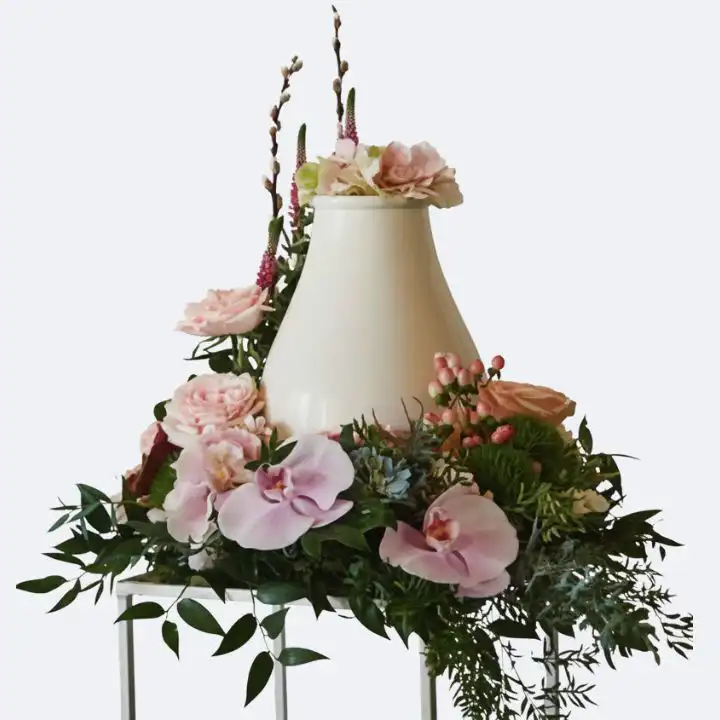 Funeral Urn Flower Arrangements with Soft Pink Orchid 1 Funeral Urn Flower Arrangements featuring soft pink orchids, roses, and lush greenery for a respectful memorial display.